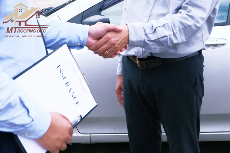 How Are Hidden Roof Damages Handled During Insurance Claims 1 Insurance Agent handshake with Inspecting Damaged